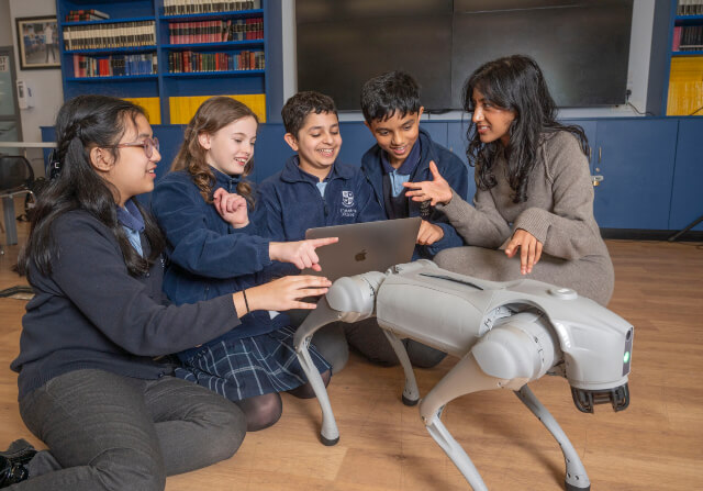 BAE Systems apprentice, Lache', with school pupils.