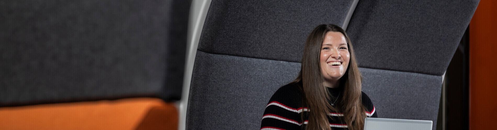BAE Systems employee smiling